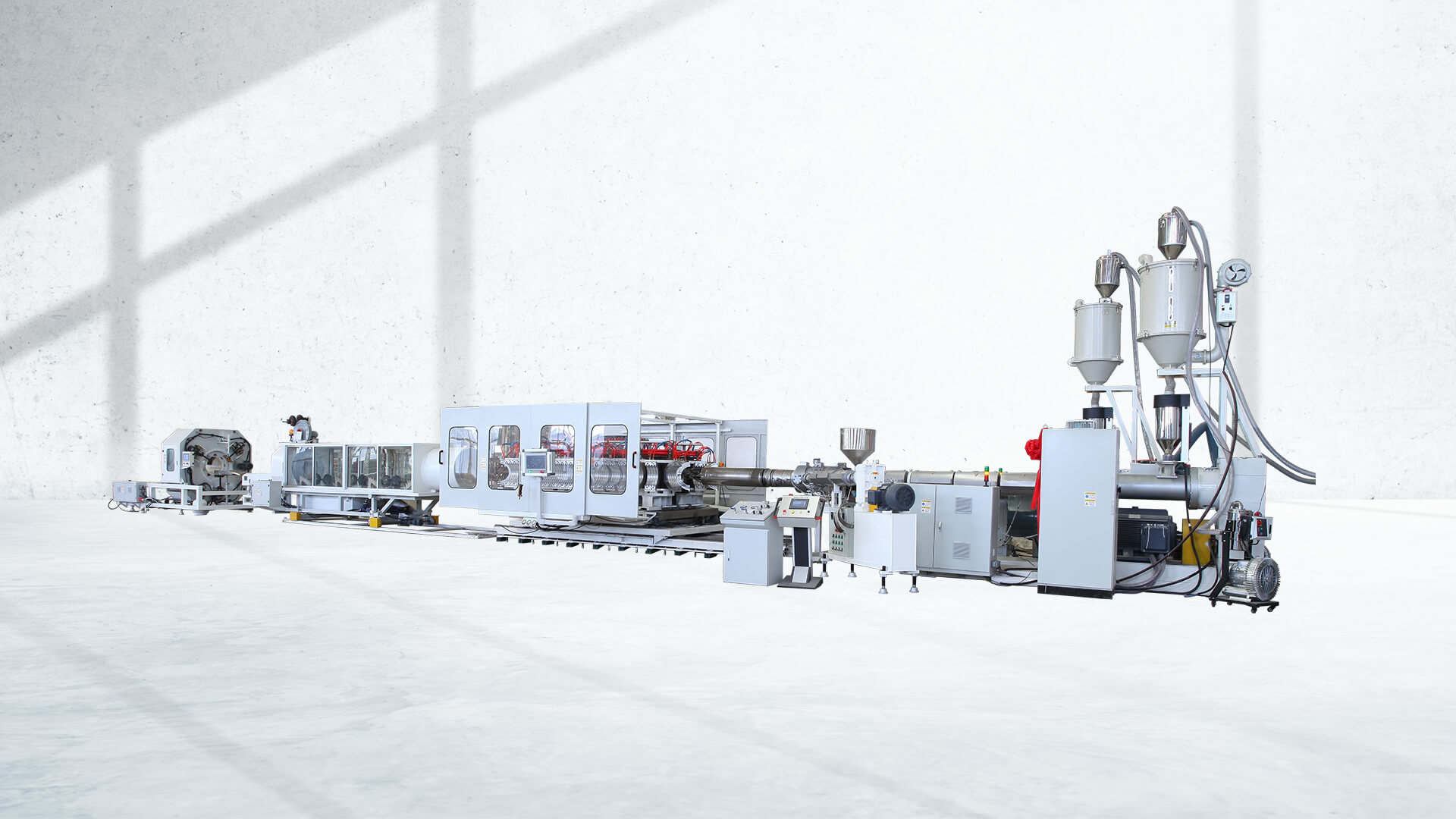 Xinrongplas Automatic Pipe Drilling & Slotting Machines: Post-Extrusion Automation for Maximum Efficiency